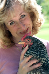 Sy with one of her hens: credit Vicki Stiefel