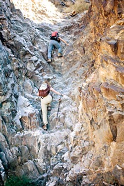 Climbing a rock wall